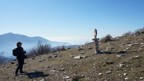 The Squeeze looking at a carefully balanced, sculptural stack of rocks