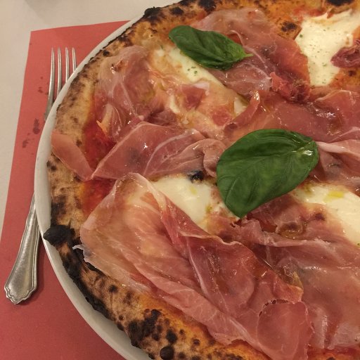 Pizza with mozzarella di bufala and Mangalitsa prosciutto