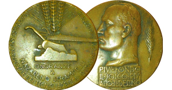 1933 medal to commemorate Nazareno Strampelli. One side shows a plough and ears of wheat, the other a profile of Mussolini and an ear of wheat with the motto Più fondo il solco, più alto il destino; The deeper the furrow, the higher the destiny.