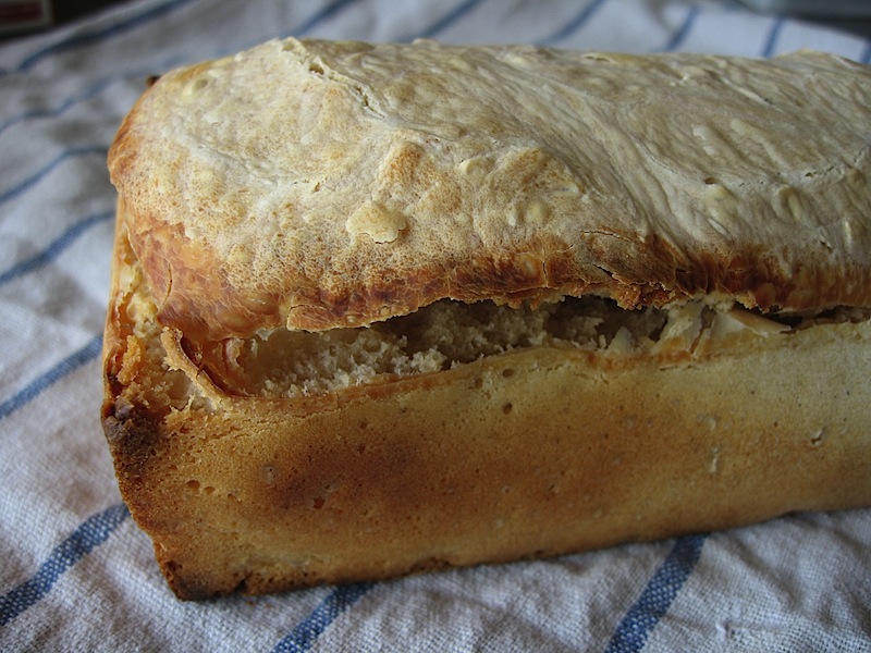 The resulting loaf, which did not rise but did pop its top, suggesting underproofing!